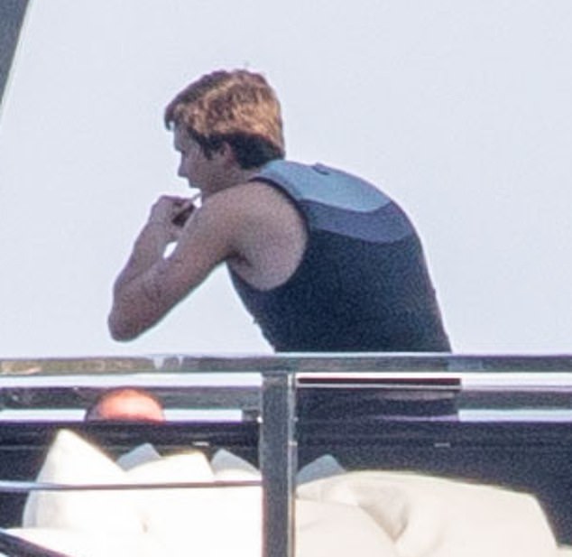He later relaxed with his father following the energetic outing