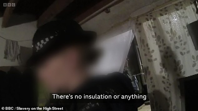 Cameras captured the moment police raided a home in London where nine people were living in cold and cramped conditions after being brought to the UK to work in 'slave conditions'