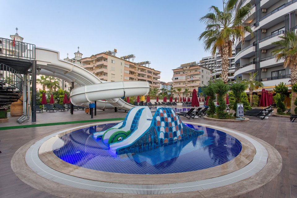 Hotel pool with waterslides.