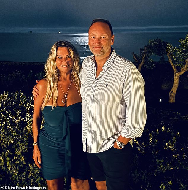 A further image showed the manager flash the flesh in a strapless navy mini dress