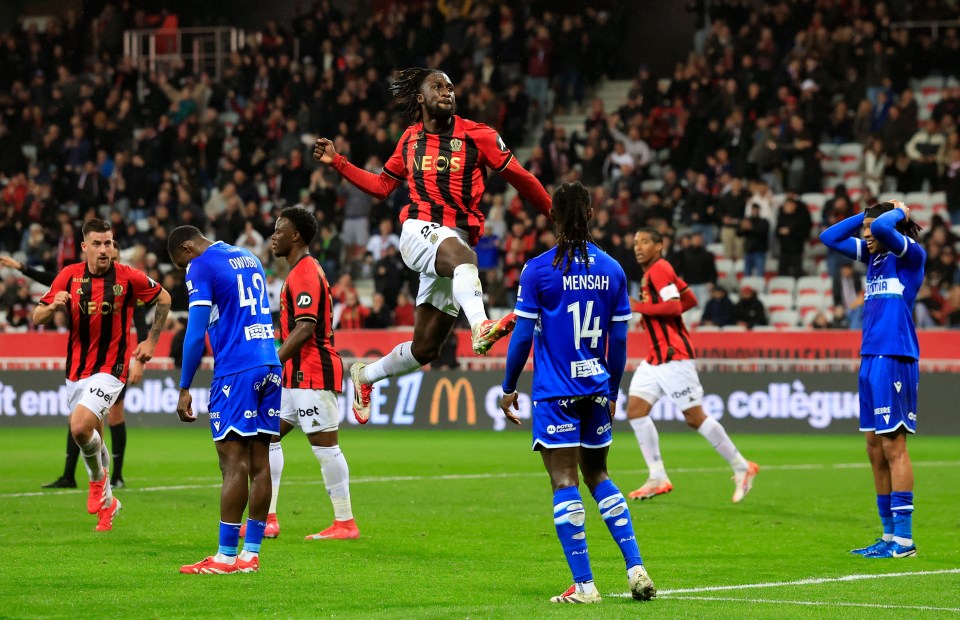 Soccer player celebrating a goal.