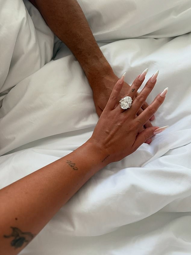 The brunette beauty shared a picture of a jaw-dropping diamond ring alongside a caption that read: 'Yes I do. In this and in all my lives'