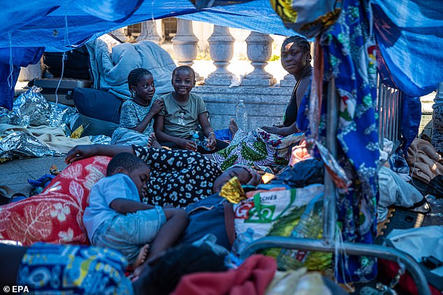 Nearly 200 migrants, mostly women, children and families, have been gathered on the square in front of the building since August 5 amid a protest organised by the Utopia56 association