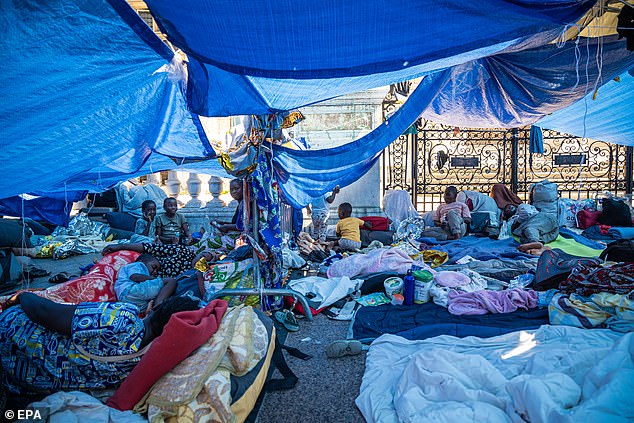 After nights in front of the town hall, wrapped in blankets and sleeping bags on the ground, the migrants, some of whom are legally resident in France, were seen shouting: 'We want housing! Zero children on the streets!'