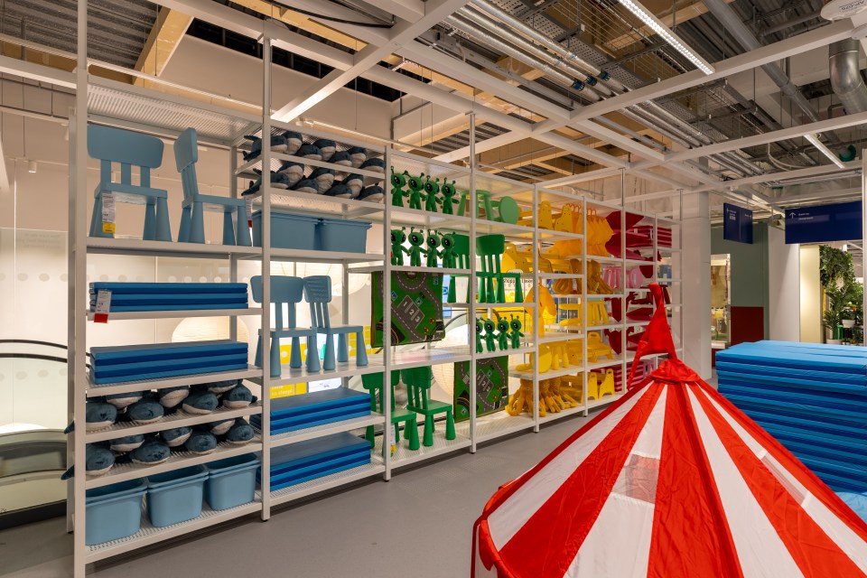 IKEA children's furniture and play items on display.