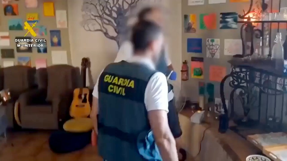 Spanish police raiding a spiritual retreat.