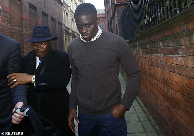 Boateng (right) is seen leaving Birmingham Magistrates Court in 2013