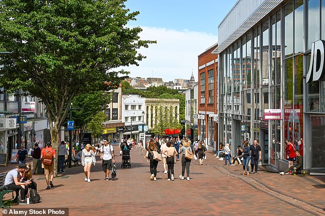Pictured is Bournemouth's high street back in June 2021, with shoppers walking through it