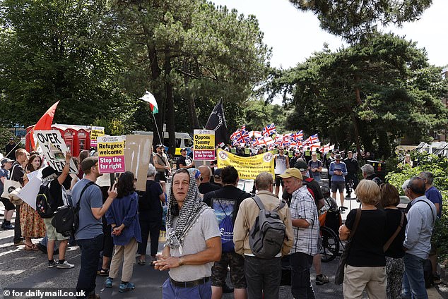 Pro-migrant activists face off against anti-immigration protests during a tense rally on August 8