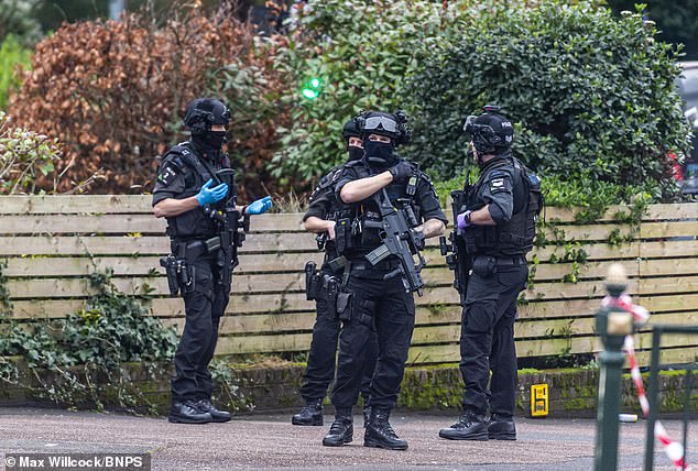 Armed officers were at the scene of the incident where two Egyptian asylum seekers stabbed a pair of Afghan college students last year