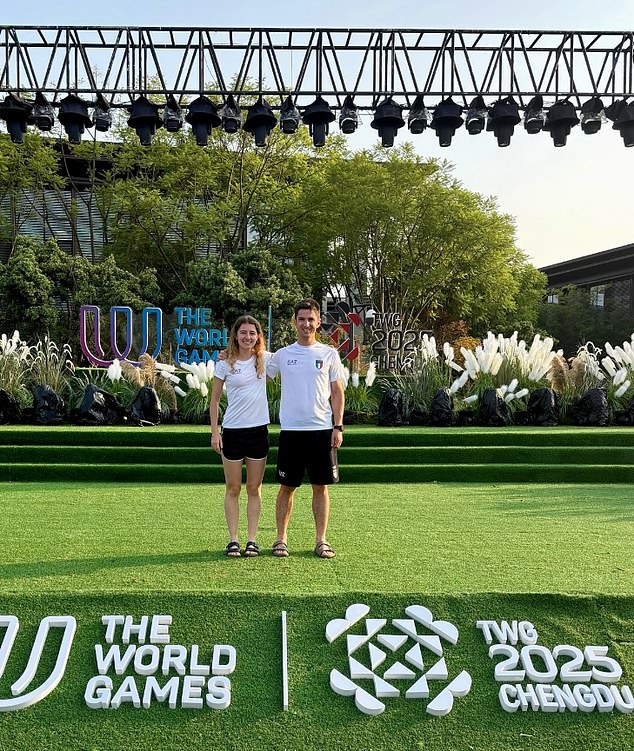 Debertolis, seen with his teammate, was taking part in the final of the men's middle-distance event when he collapsed