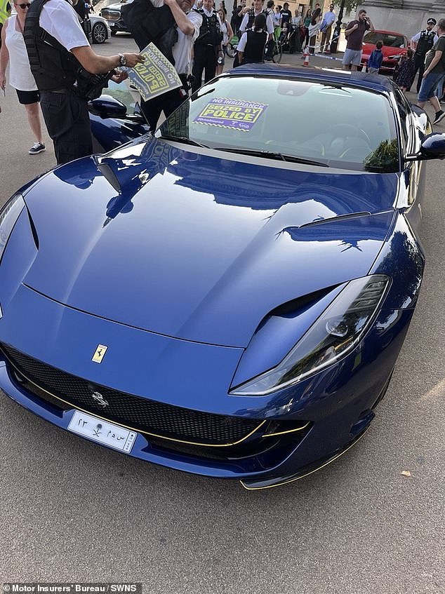 Pictured: a Ferrari seized during the clampdown. The flash sports cars were confiscated across Hyde Park , Kensington and Chelsea, with the Motor Insurers' Bureau (MIB) working alongside officers to impound the extravagant vehicles