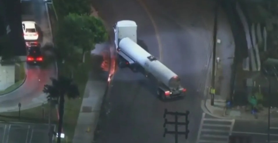 Aerial view of suspects leading police on a chase, carjacking vehicles including a tanker truck.