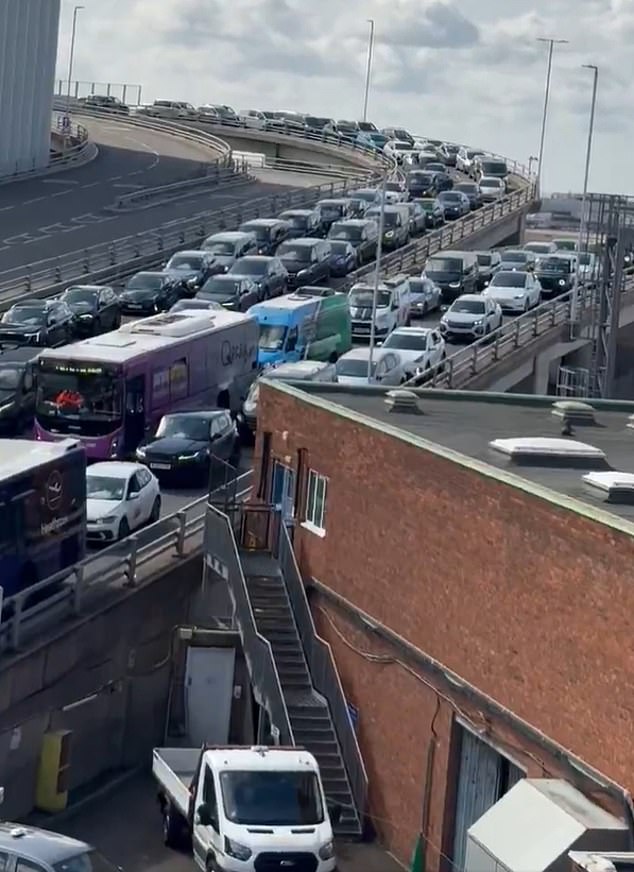 Dozens of vehicles can be seen gridlocked on roads leading up to the airport following the tunnel shutdown last Tuesday