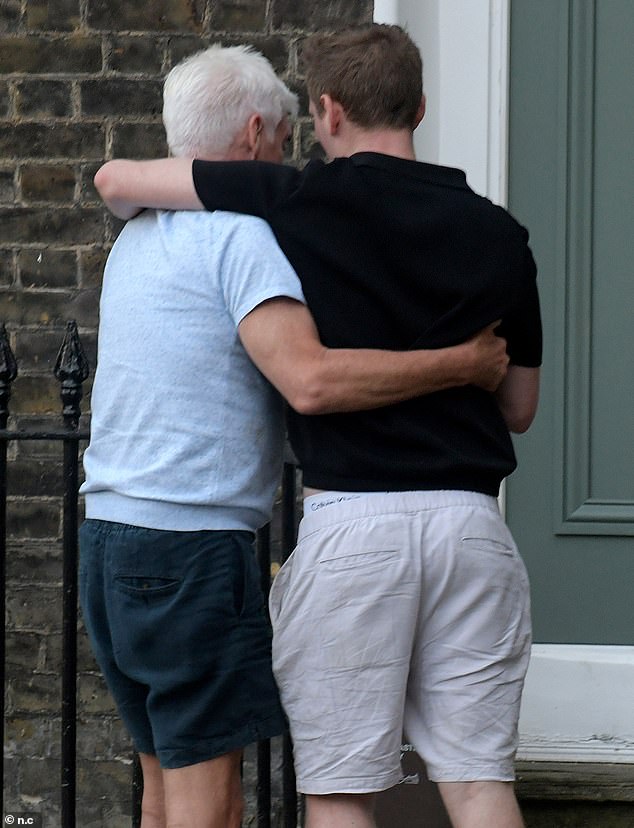 Following their departure from the eatery, Phillip and handsome Joshua got up close while sharing a cosy cuddle before nuzzling into one another