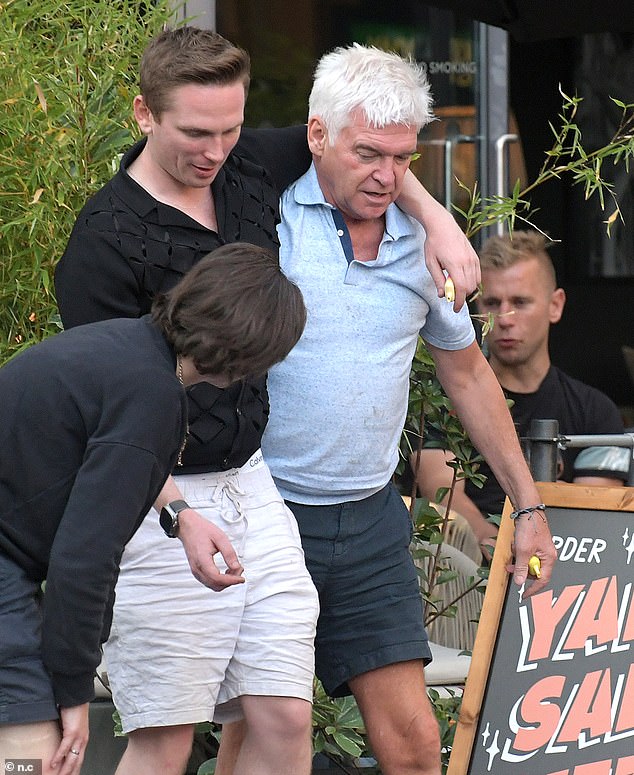 The duo were stumbling from the restaurant