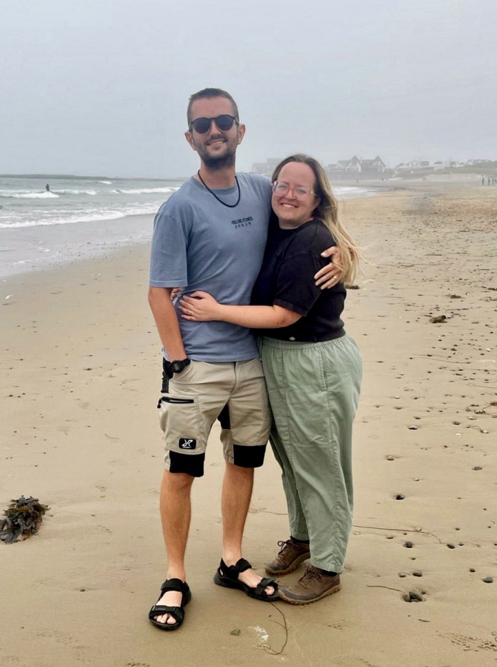 Rachel Hale, 39 and husband Lewis 35, live in a caravan in Anglesey, Wales. A couple spend just £330 a month living full-time on a campsite  and only work two days a week. Rachel Hale, 39 and husband Lewis 35, sold their home and used their £30k savings to travel the UK in a campervan for a year. Now, after their funds began to run low the couple live full-time at a campsite in Anglesey, Wales, after purchasing a caravan and working on the site for the past year. Lewis is a part-time camp warden and Rachel works in a local cafe, but they both only work twice a week. Rent and bills is free and included for workers on the site, with the pair paying just £8 per month for gas to cook their meals with. Once the camping season ends in October, the couple hope to travel across Europe in their campervan as they will have saved £8,000 from their low budget life. Photo released 12/08/2025