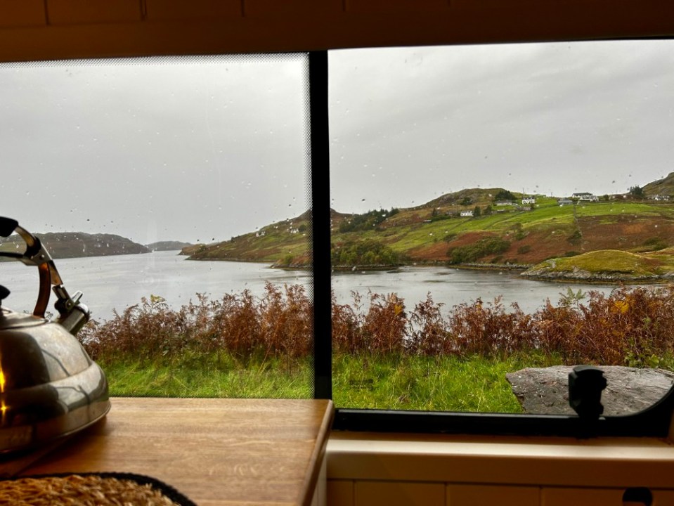 Views from theor campervan. A couple reveal how they afford to only work two days a week - by spending just ¿330-a-month living in a caravan. Rachel Hale, 39 and husband Lewis 35, have lived on a campsite full time in Anglesey, Wales since March 2024. Photo released 12/08/2025