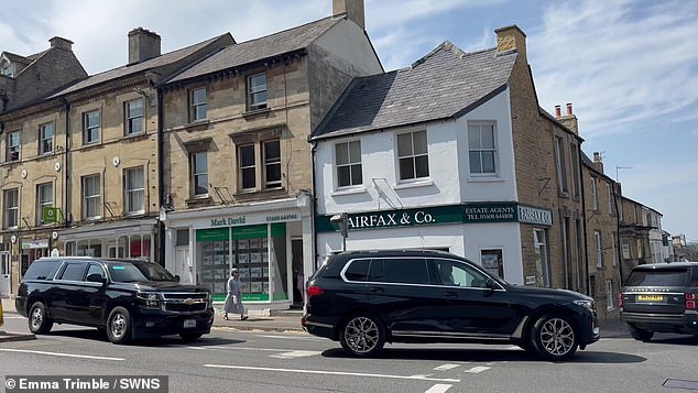 The vice presidential convoy making its way through Chipping Norton with blacked out windows