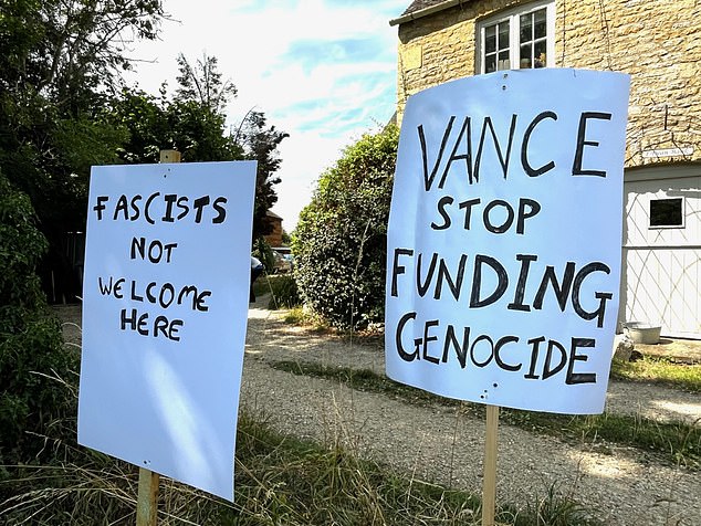 Protest signs read 'Fascists not welcome here' and were placed outside houses