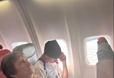 Romeo Beckham on a plane.