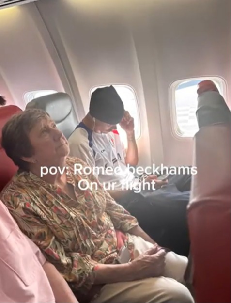 Romeo Beckham on a plane.