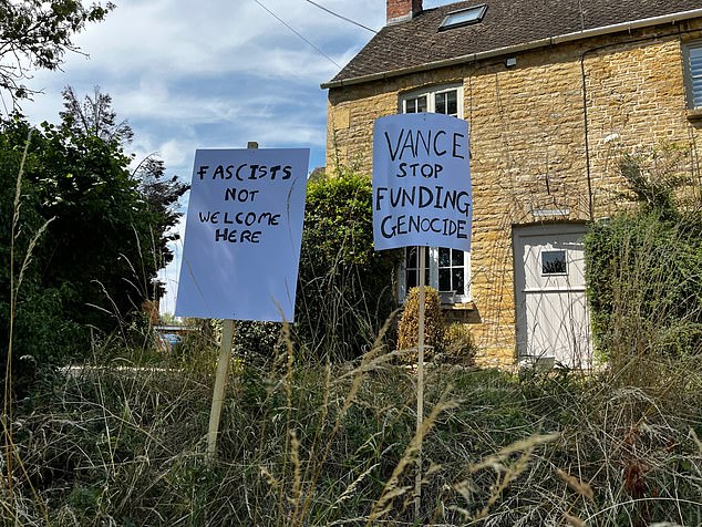 Signs left out in a front garden to welcome Mr Vance