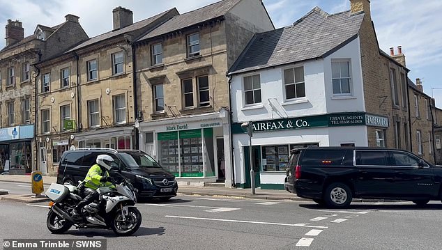 The motorcade is accompanied by motorcycle outriders to clear traffic