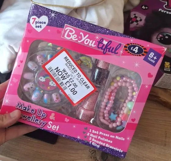 A reduced-price makeup and jewelry set for kids.