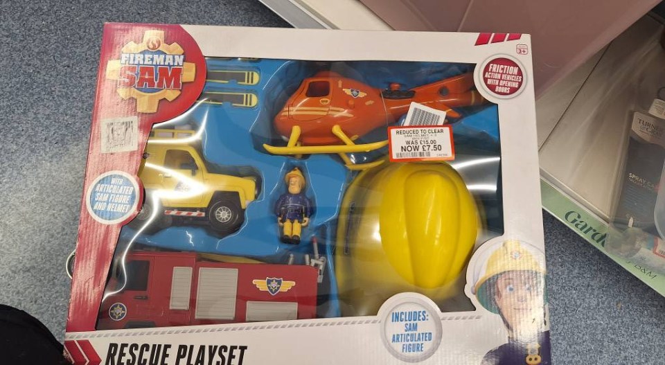 Fireman Sam rescue playset with helicopter, truck, and fireman figure; reduced to £7.50.