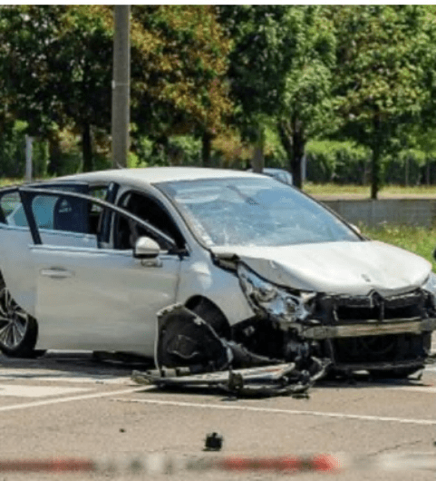 Severely damaged car after a fatal hit and run.