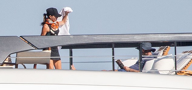 David and Victoria on their yacht in Tuscany. The families are said to have fallen out when Nicola snubbed Victoria’s fashion brand for her main wedding and chose to wear a dress by a rival designer, Valentino