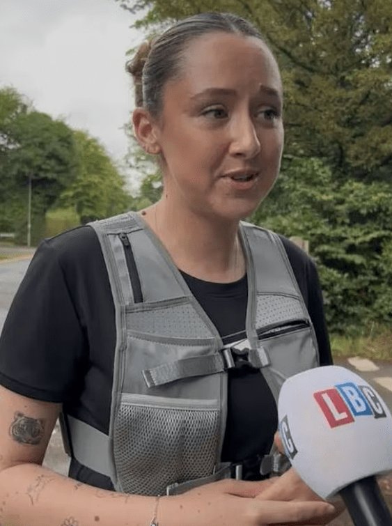 Woman being interviewed by LBC reporter.