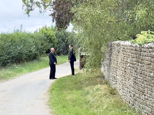 Security personnel pictured outside Vance's Cotswolds retreat, just down the road from Clarkson's Diddly Squat Farm