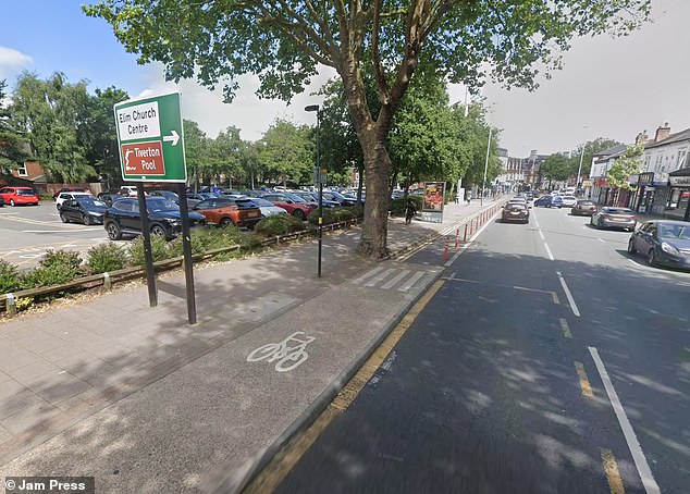Pictured: A GV of Bristol Road in Birmingham, showing the car park on the left where the Vauxhall Insignia caught fire