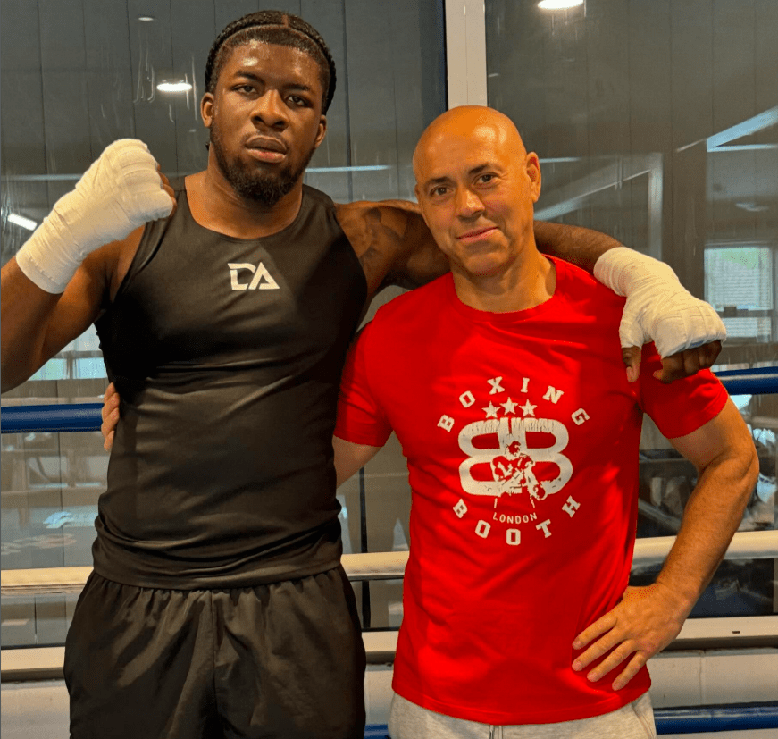 Two boxers posing together.