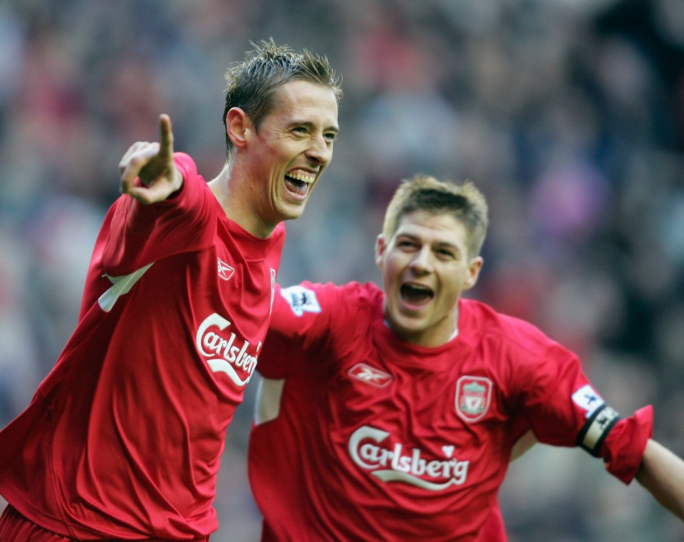 Peter Crouch and Steven Gerrard celebrating a Liverpool goal.