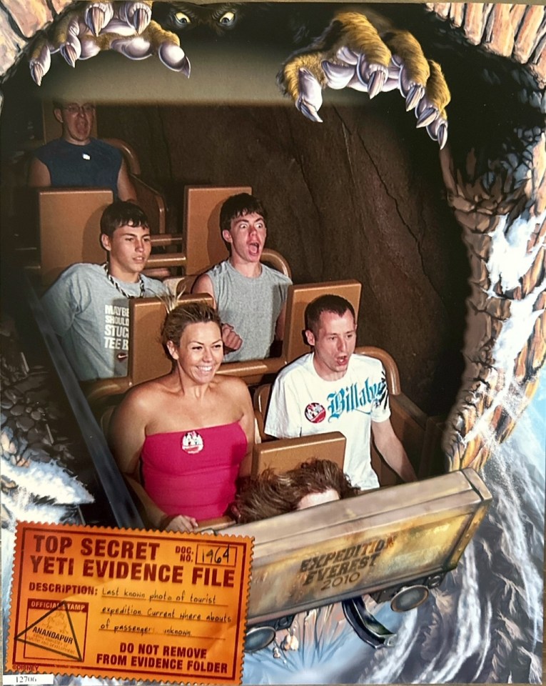 Photo of people on a theme park ride with a Yeti appearing to reach for them.