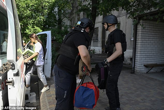 Authorities help evacuation efforts in Dobropillia on Sunday as Putin's forces make a key breakthrough