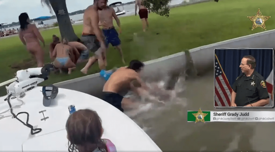 Video still of a large fight at a Florida lake; inset shows Sheriff Grady Judd.