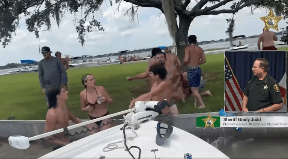 Video still of a large fight at a Florida lake, with Sheriff Grady Judd inset.