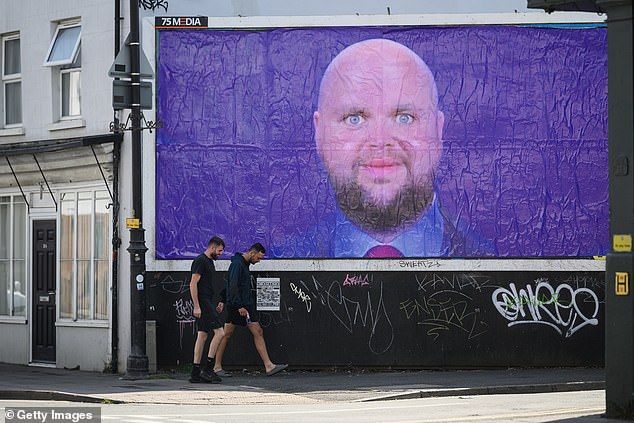 A poster depicting a viral meme of the Vice President was displayed on a billboard in Cheltenham, Oxfordshire