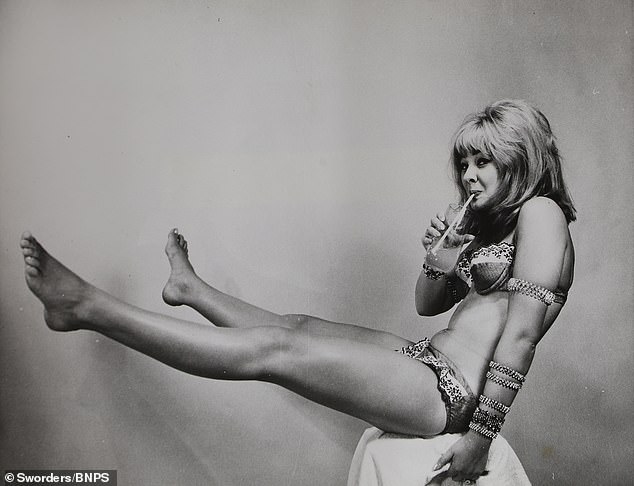 Mandy Rice-Davies posing in a photo shoot for photographer Tom Blau