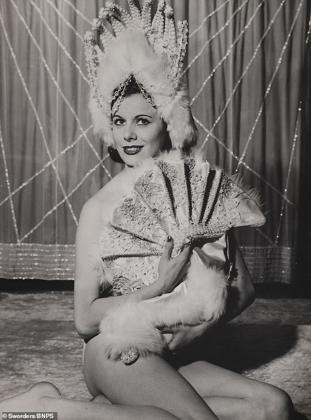 Another of the Cabaret Club showgirls, posing up for the photo shoot