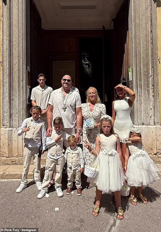 The couple were joined by children, Prince John James, 13, Prince Tyson II, eight, Valencia seven, Prince Adonis Amaziah, six, Athena, three, Prince Rico, 22-months, and Venezuela, 15