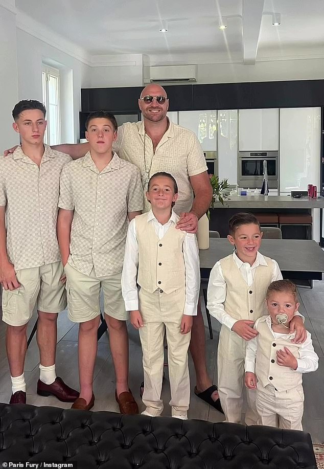 Tyson and his son opted for cream and beige ensembles for the church ceremony