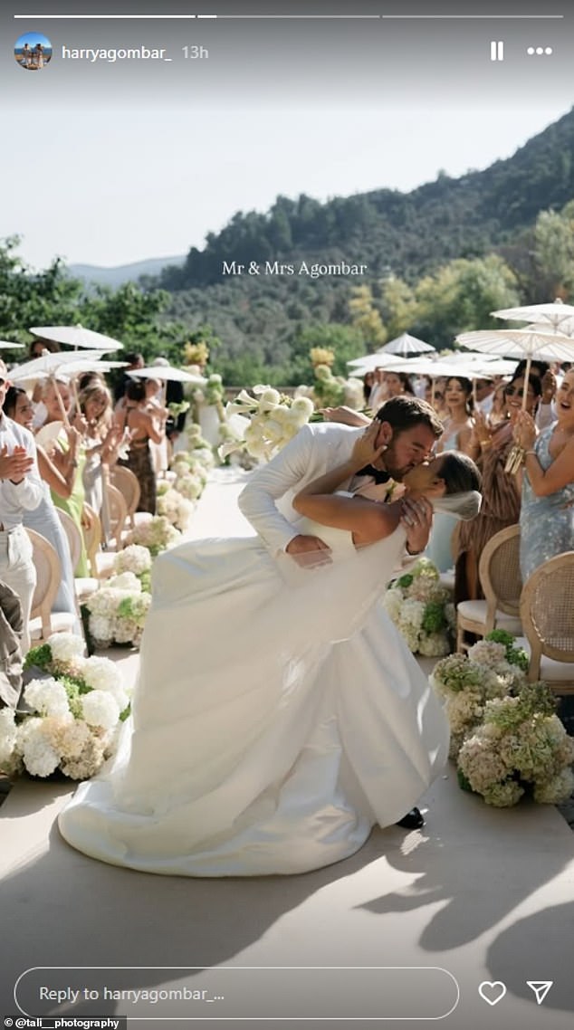 The stunner looked nothing short of sensational in a gorgeous white strapless wedding dress which featured a long full train