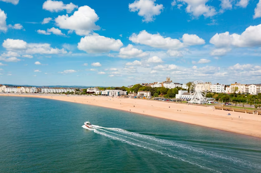 Aerial view of Haven's Devon Cliffs beach and coastline.