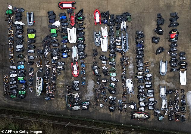 A 'graveyard' of used migrant dinghies pictured near Dover earlier this year