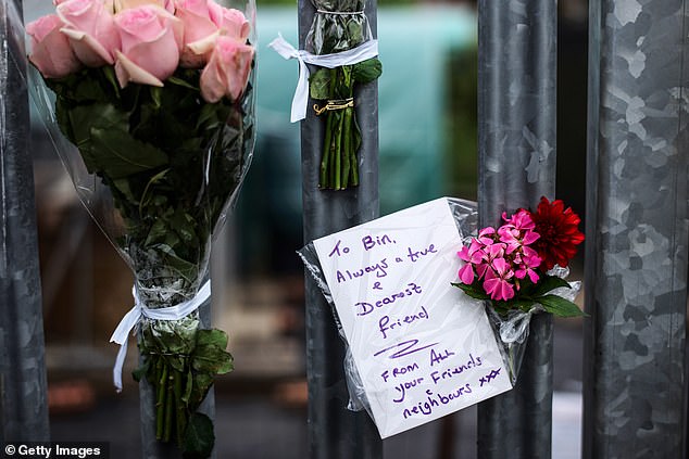 Flowers and a note left for Mr Kohli, which reads 'To Bin, always a true and dearest friend'